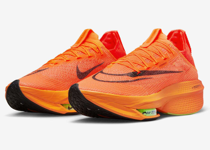 Orange Nike running shoes.